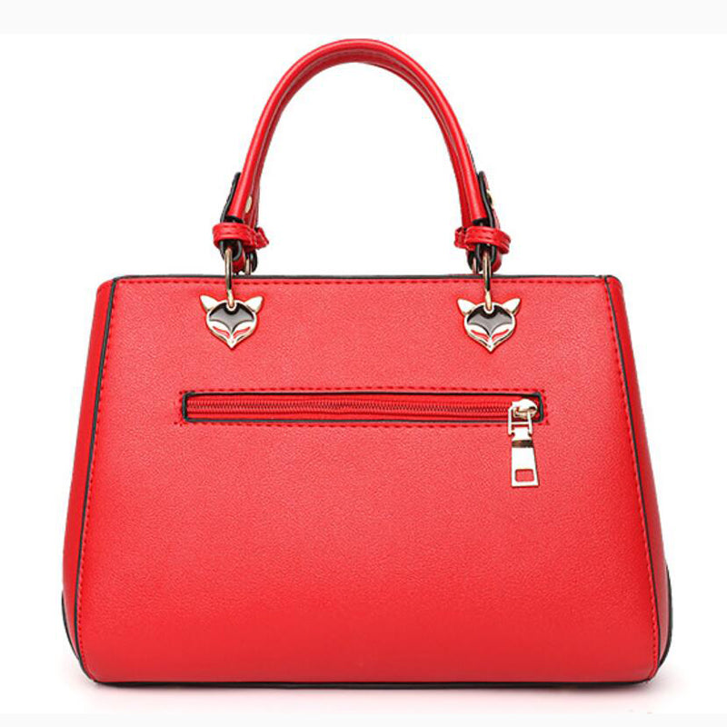 Sibylle Color Block Top Handle Bag with Pom Pom Charm