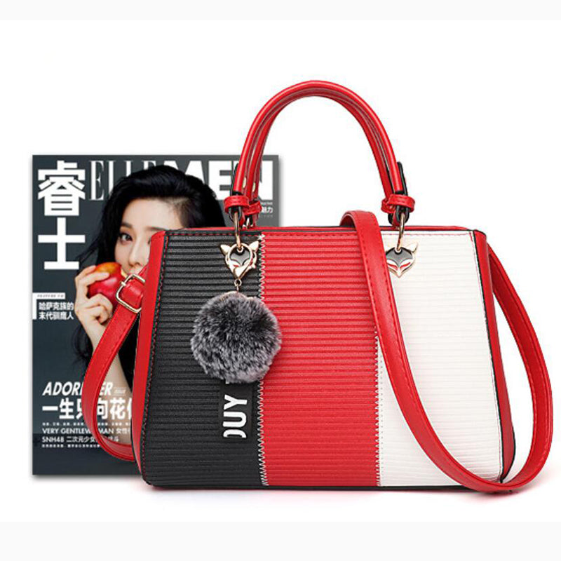 Sibylle Color Block Top Handle Bag with Pom Pom Charm