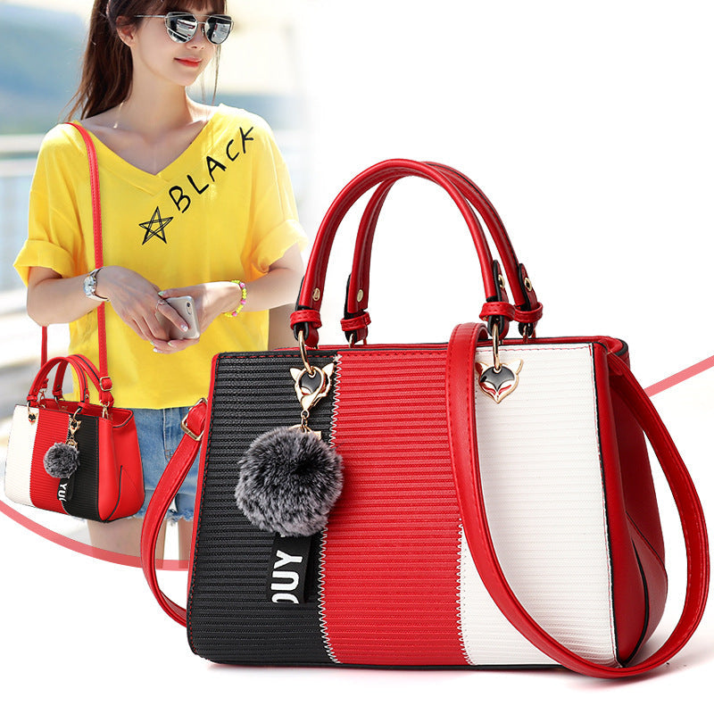 Sibylle Color Block Top Handle Bag with Pom Pom Charm
