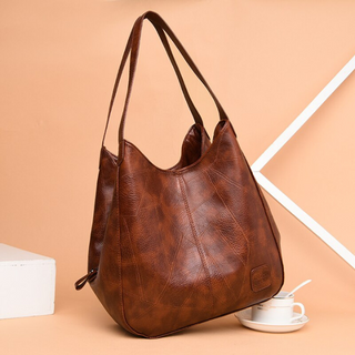 Naoko - Leather shoulder bag - Spacious interior